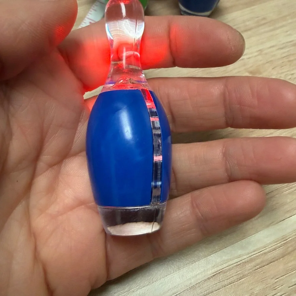 Set of 4 Bowling Pin Light Up LED Keychains Blue Green Orange Novelty